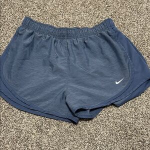 Nike Women’s Blue Athletic Shorts with White Swoosh